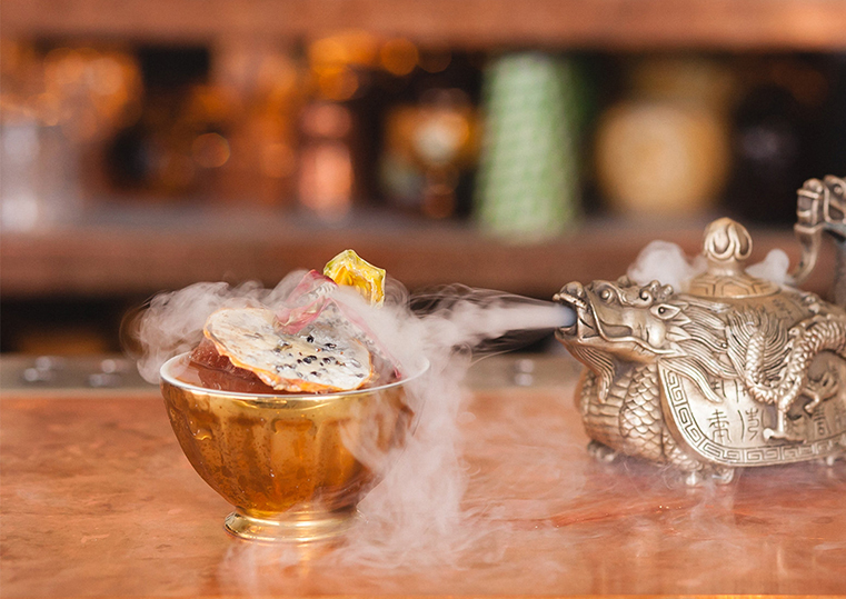 Stunning close-up of an elegant cocktail and cocktail smoker - The Spirit Lab Advanced Mixology Course